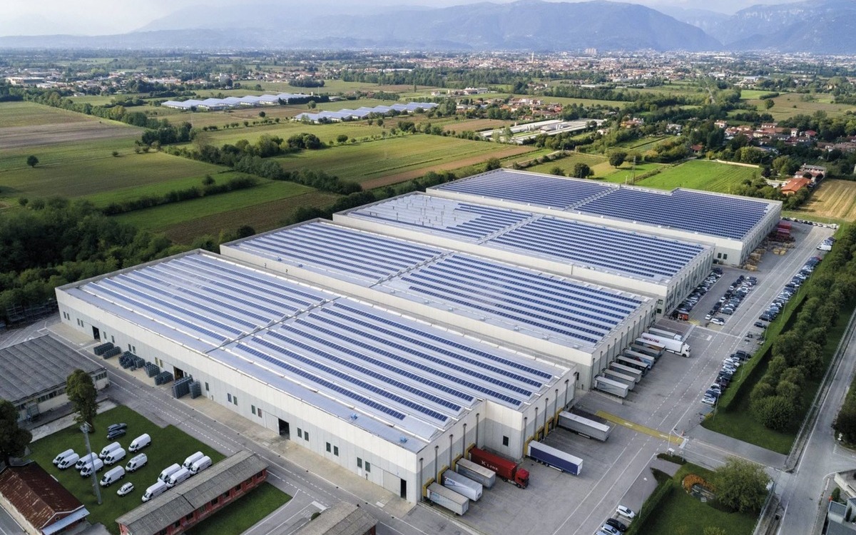 Aerial view of a large industrial building.